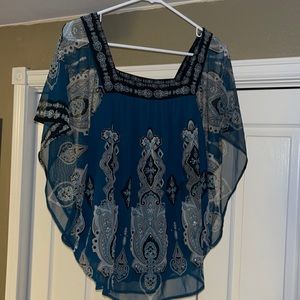 INC beautiful shear top with built in under layer.  Woman’s size large.
